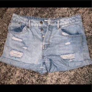 Light distressed shorts